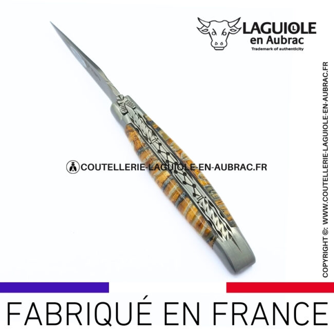 couteau pliant laguiole double platines ciselées manche molaire de mammouth