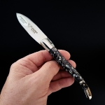 couteau a huitre en coquilles de moules