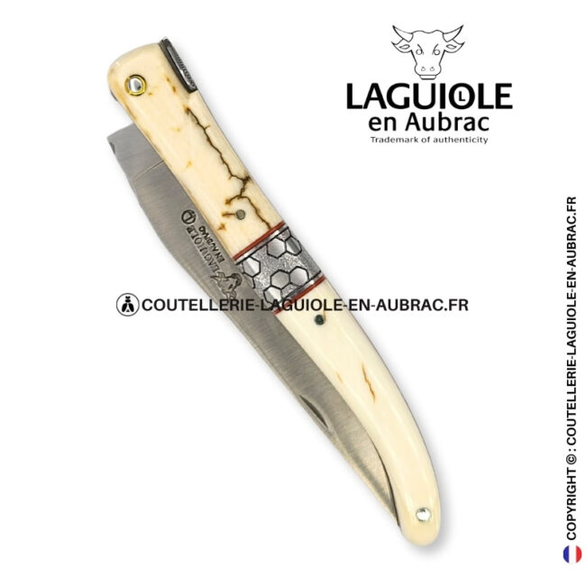 olórin le blanc: couteau laguiole plein manche mitre centrale croûte d'ivoire de mammouth
