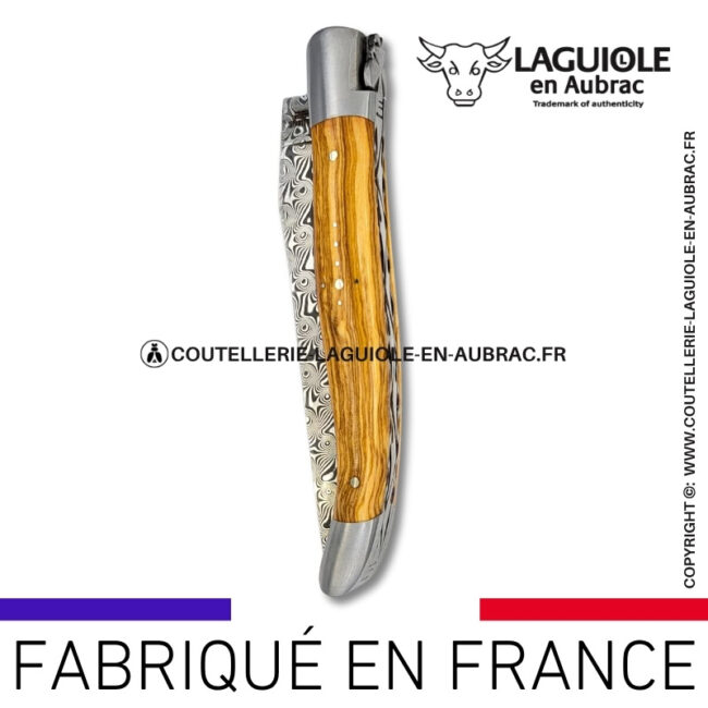 couteau laguiole en bois d'olivier platines guillochées et lame damas balbach inox