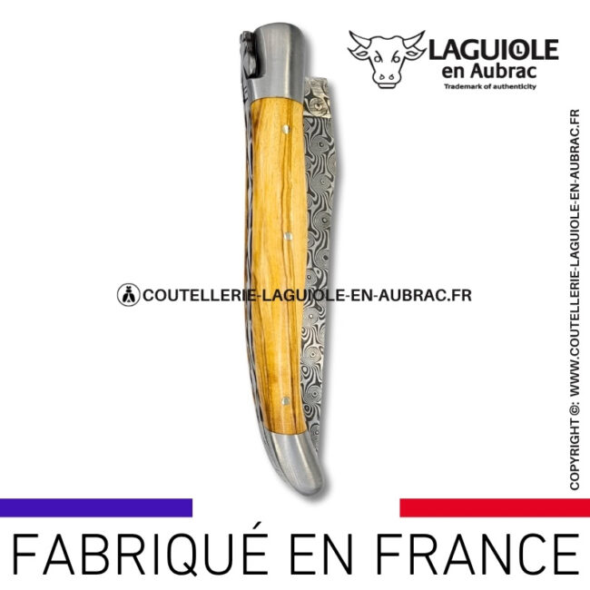 couteau laguiole en bois d'olivier platines guillochées et lame damas balbach inox