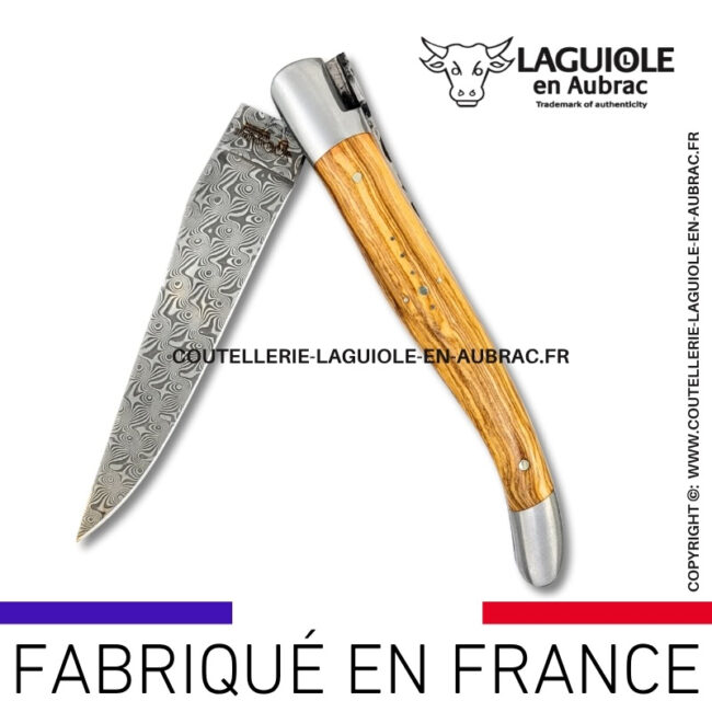 couteau laguiole en bois d'olivier platines guillochées et lame damas balbach inox