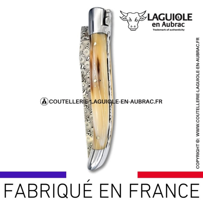 couteau laguiole en pointe de corne platines guillochées et lame damas balbach inox