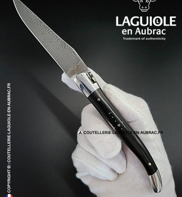 couteau laguiole en bois d'Ébène platines guillochées et lame damas balbach inox