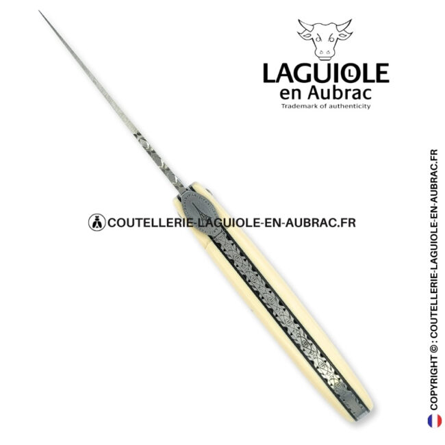 origine tour eiffel : couteau laguiole plein manche en elforyn blanc