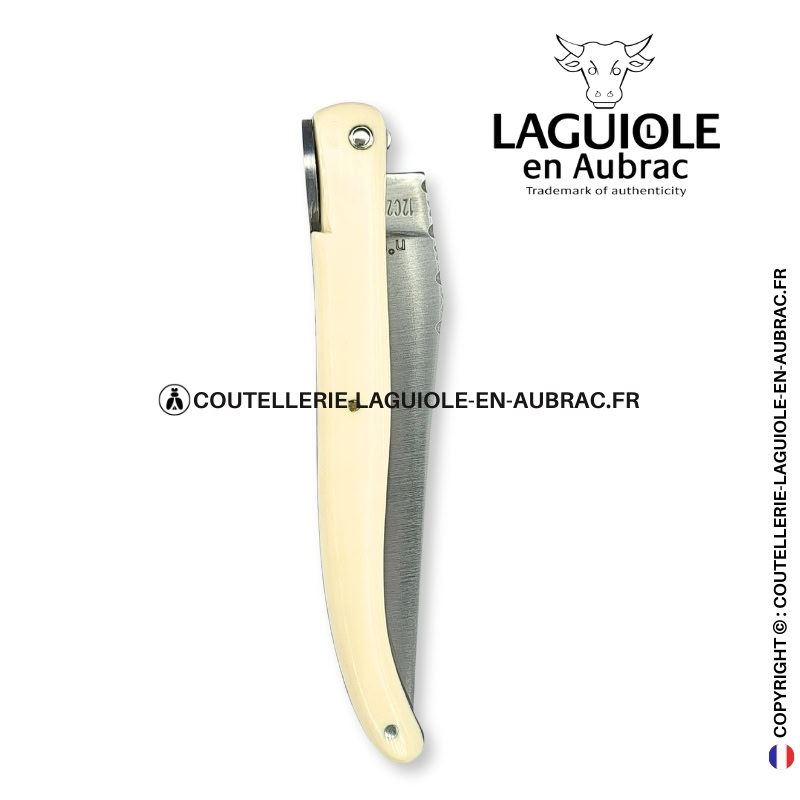 origine tour eiffel : couteau laguiole plein manche en elforyn blanc