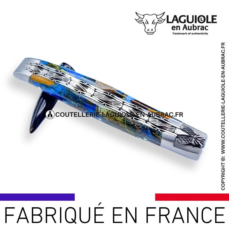 couteau laguiole en aubrac pliant aux doubles platines "fusion ivoire bleu" finition brillante