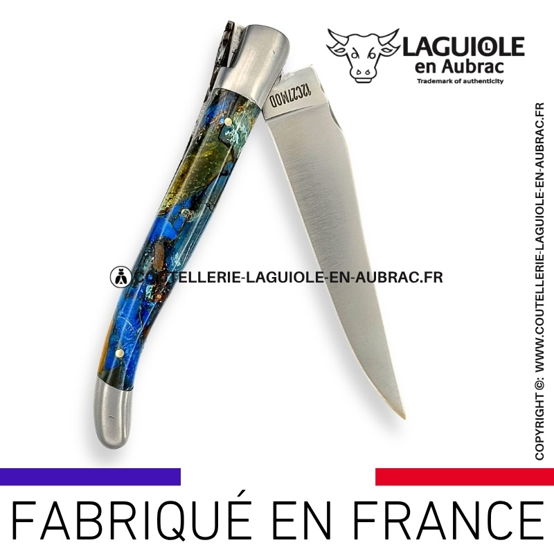 couteau laguiole en aubrac pliant aux doubles platines "fusion ivoire bleu" finition brillante