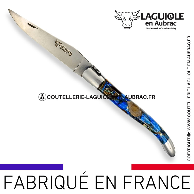 couteau laguiole en aubrac pliant aux doubles platines "fusion ivoire bleu" finition brillante