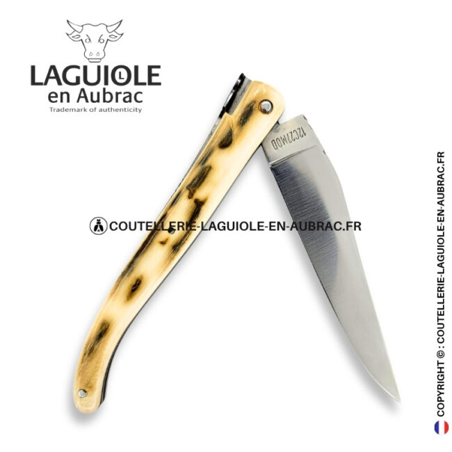 brume glaciaire : couteau laguiole en croûte d'ivoire de mammouth – abeille sculptée – ressort ciselé et platines guillochées