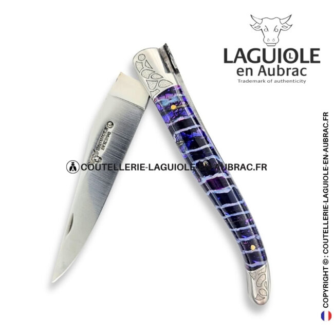 corolle de nuit : couteau laguiole en molaire de mammouth violette – abeille sculptée – ressort et mitres ciselés