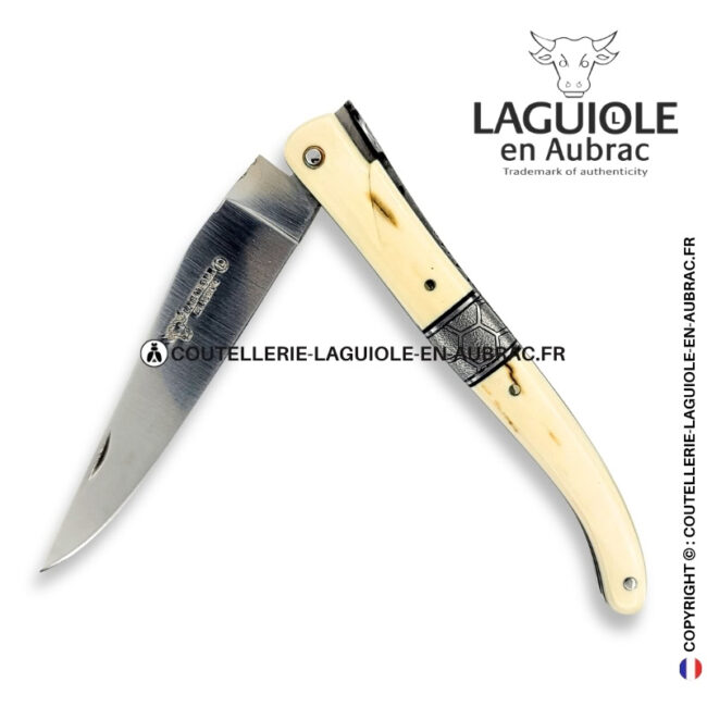 ruche des glaces : couteau laguiole en croûte d'ivoire de mammouth – abeille sculptée – ressort et mitre centrale ciselés