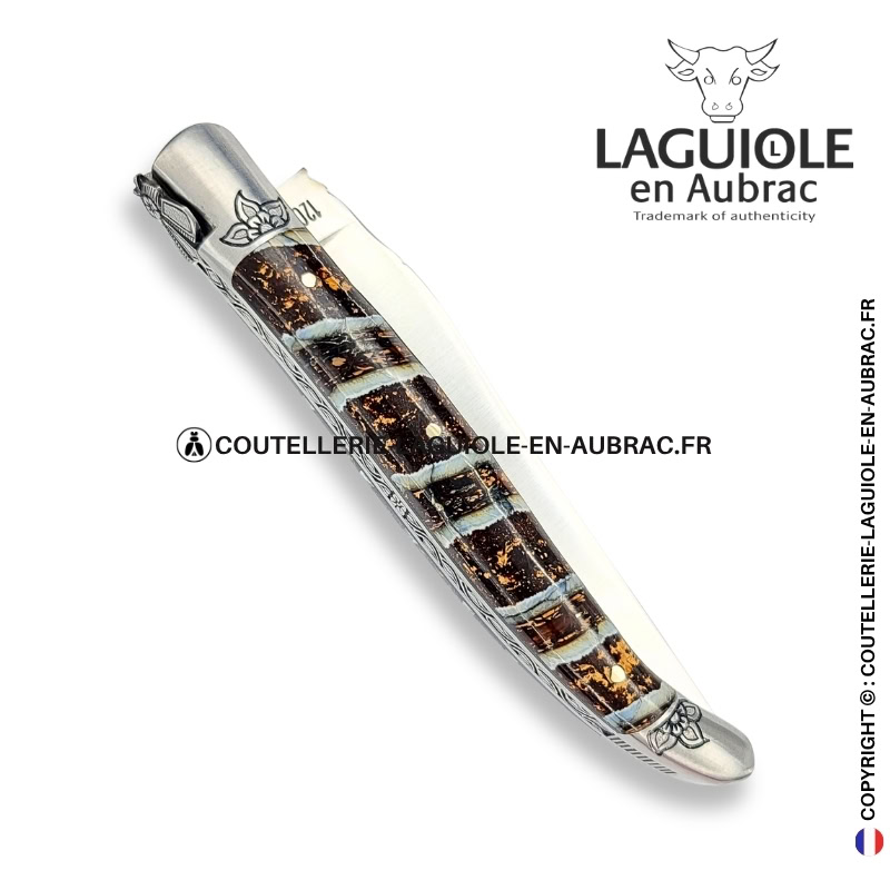 floraison fossile : couteau laguiole en molaire de mammouth – abeille sculptée – ressort et mitres ciselés