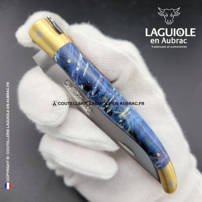 marée d'Étoiles : couteau laguiole en loupe de sureau bleue – mitres laiton et platines cuivre – abeille et ressort ciselés