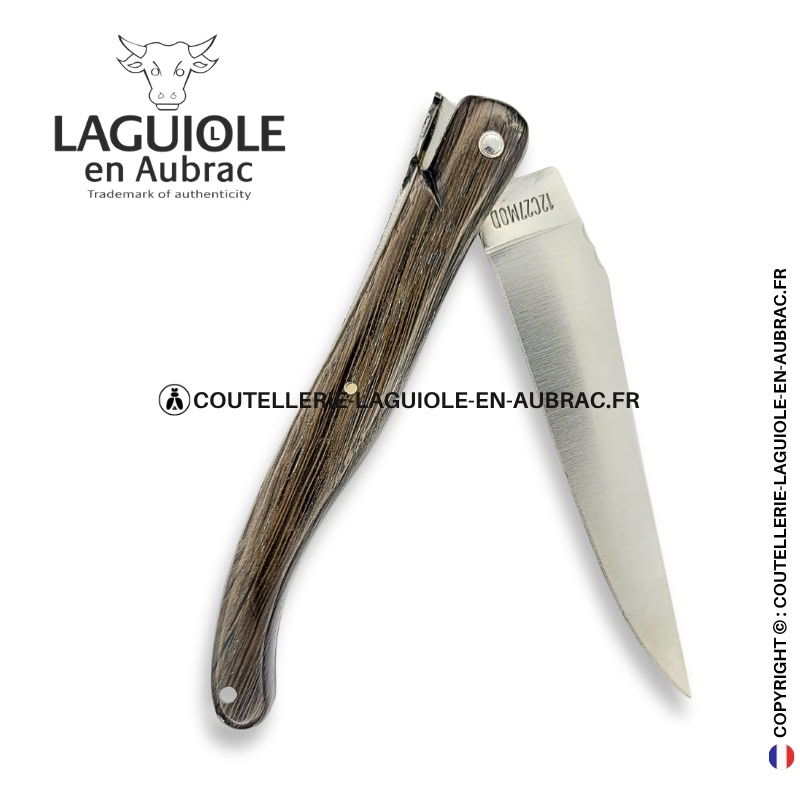 mémoire du chêne fossilisé : couteau laguiole plein manche en morta – abeille sculptée – ressort ciselé